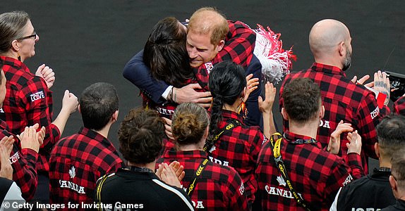 VANCOUVER, CANADA - FEBRUARY 8: Prince Harry, The Duke of Sussex hugs a Team Canada athlete during the opening ceremony of the Invictus Games Vancouver Whistler 2025 at BC Place on February 8, 2025 in Vancouver, Canada. (Photo by Derek Cain/Getty Images for Invictus Games Vancouver Whistler 2025)