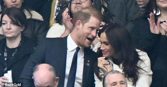 BGUK_3146594 - Vancouver, CANADA  - Prince Harry, Duke of Sussex and his wife Meghan Markle pictured attending the 2025 Invictus Games opening ceremony in Vancouver.  Pictured: Prince Harry, Duke of Sussex and his wife Meghan Markle  BACKGRID UK 8 FEBRUARY 2025   UK: +44 208 344 2007 / uksales@backgrid.com  USA: +1 310 798 9111 / usasales@backgrid.com  *Pictures Containing Children Please Pixelate Face Prior To Publication*