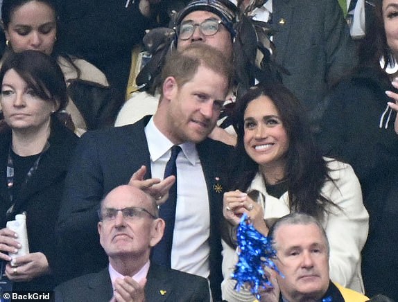 BGUK_3146594 - Vancouver, CANADA  - Prince Harry, Duke of Sussex and his wife Meghan Markle pictured attending the 2025 Invictus Games opening ceremony in Vancouver.  Pictured: Prince Harry, Duke of Sussex and his wife Meghan Markle  BACKGRID UK 8 FEBRUARY 2025   UK: +44 208 344 2007 / uksales@backgrid.com  USA: +1 310 798 9111 / usasales@backgrid.com  *Pictures Containing Children Please Pixelate Face Prior To Publication*