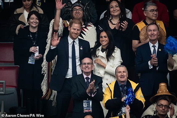 The Duke and Duchess of Sussex react as athletes arrive at the opening ceremony of the 2025 Invictus Games in Vancouver, Canada. The games will take place across Vancouver and Whistler. Picture date: Saturday February 8, 2025. PA Photo. See PA story ROYAL Invictus. Photo credit should read: Aaron Chown/PA Wire