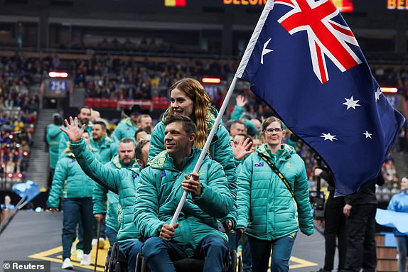 Australian athletes take part in the parade during the opening ceremony of the Invictus Games, founded by Britain's Prince Harry, at BC Place stadium in Vancouver, British Columbia, Canada February 8, 2025.  REUTERS/Chris Helgren