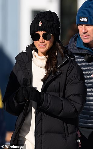 It comes after it was revealed that the Duchess (pictured) won't be joining Harry at the rest of the games - instead travelling back to Montecito to see her children Prince Archie, five, and Princess Lilibet, three