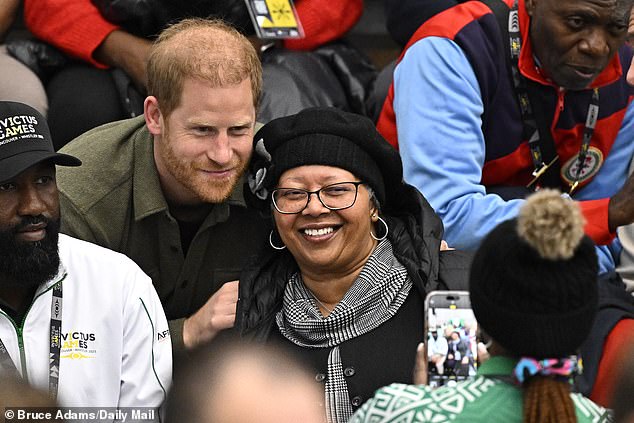 Prince Harry with veterans minister Alastair Carns MP