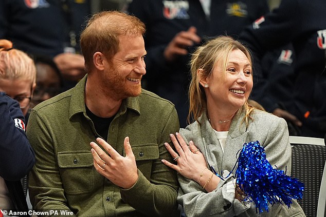 The Duke of Sussex and Ksenia Ilenkiv watching the sitting volleyball at Vancouver Convention Centre (VCC)