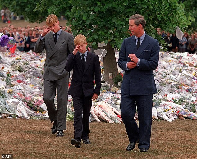 Prince Charles accompanied his sons after they arrived at Kensington Palace to view some of the flowers and mementos left in memory of their mother five days after her death