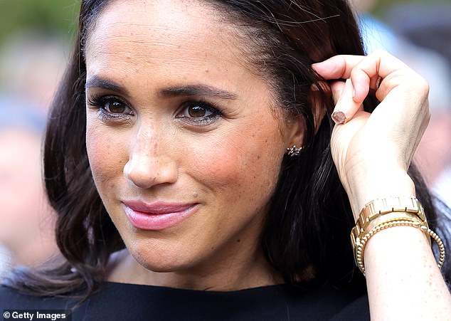 The Duchess of Sussex was likewise chatty with the crowds who had come to pay their respects