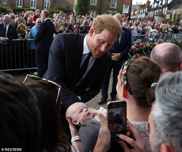 Harry paid special attention to possibly the youngest among the crowd