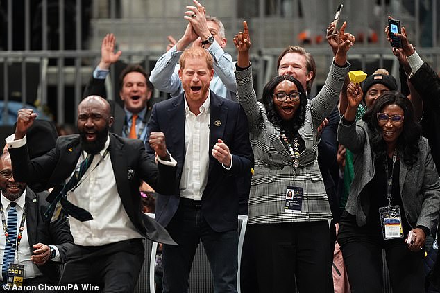 Harry makes two fists in celebration at the Invictus Games in Vancouver on Saturday