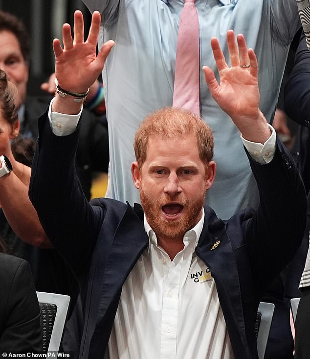 The Duke participates in a Mexican wave during the sitting volleyball final