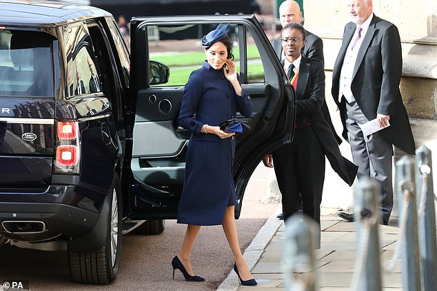 Meghan arrives at the wedding of Princess Eugenie and Jack Brooksbank on October 12, 2018