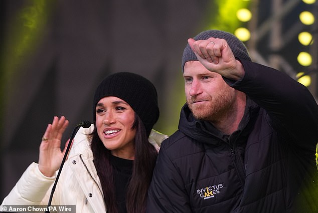 Harry spoke to their favourite US-based magazine 'People' to talk about Invictus and the impact it has on people's lives. Pictured: Harry and Meghan on stage at the welcome celebration