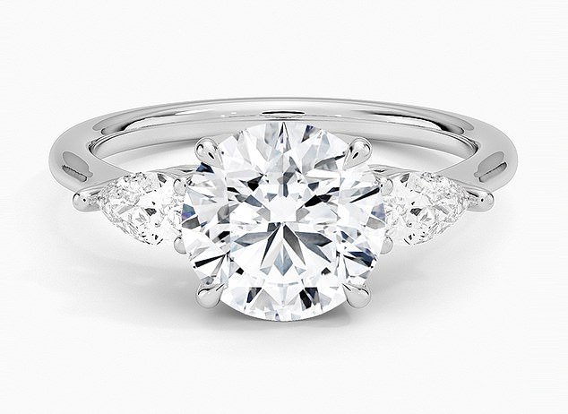 Gleaming pear-shaped diamonds frame the centre stone in this £4,050 ring by Brilliant Earth