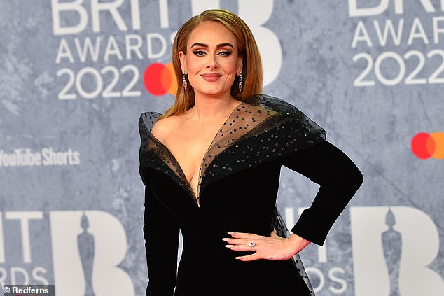 Adele's elegant jewel is set with huge 8-10-carat pear-shaped diamond on a thin diamond set platinum band, seen here at the Brits in 2022