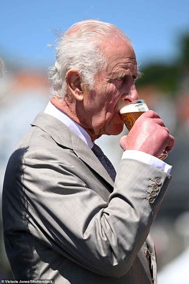 In July last year King Charles joked he'd 'better not have too much' as he sampled a beer named in his honour during a visit to Guernsey with Queen Camilla (pictured July, 2024)