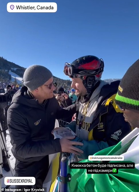 The Duke of Sussex , 40, appeared slightly uncomfortable as he spotted Igor Krystak - a Sports Manager for Team Ukraine at last year's games - holding out a copy of his bombshell memoir after enjoying some skiing with his teammates.