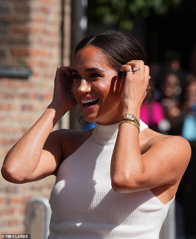 The Duchess of Sussex is rarely seen without her £3,750 Cartier 'Love' bracelet