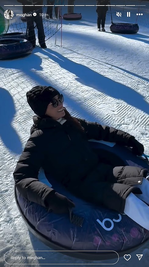 Meghan was previously spotted laughing while on a rubber dinghy in the snow