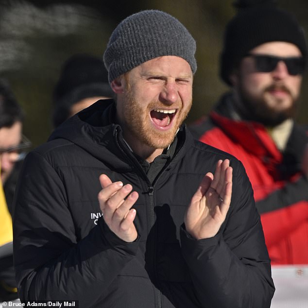 The prince claps at the the Alpine Skiing and Snowboarding Novice Finals