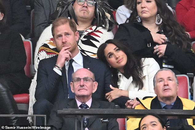 Prince Harry and wife Meghan are also close pals and neighbors with Perry and her fiance Orlando Bloom; the couple seen at the opening ceremony on Saturday night