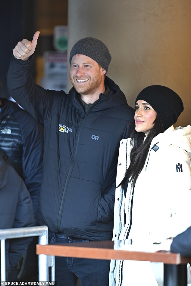 Prince Harry gives the thumbs up as he and Meghan Markle attended the Whistler welcome party