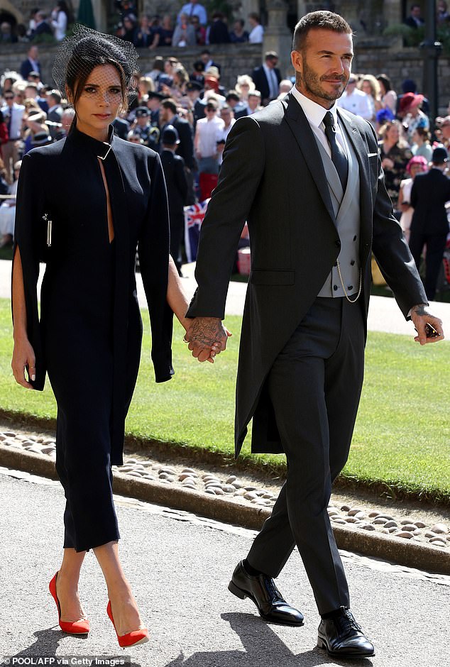 Victoria Beckham (pictured, left) and David Beckham (pictured, right) are seen arriving at the wedding ceremony of Prince Harry and Meghan Markle in May 2018 in Windsor