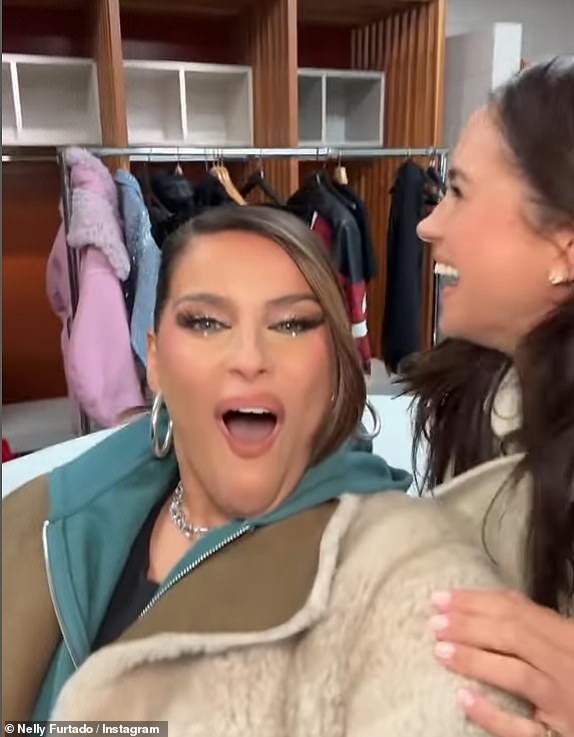 Meghan laughed as her husband photobombed the clip