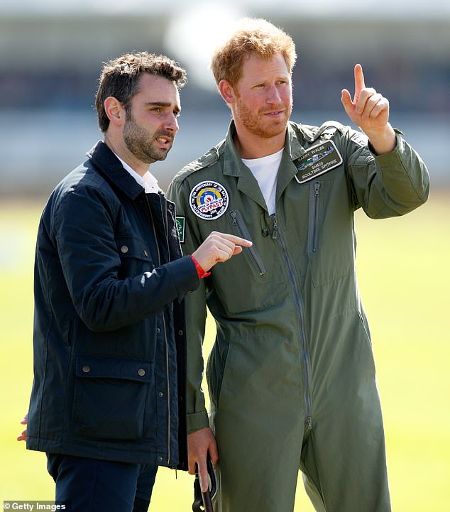 Prince Harry pictured talking to Nick while attending a Battle of Britain Flypast at Goodwood Aerodrome in 2015