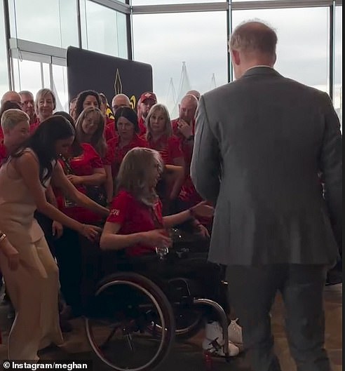 The Duchess of Sussex is seen in footage apparently moving a Team Canada member whilst at the True Patriot Love Foundation breakfast in Vancouver