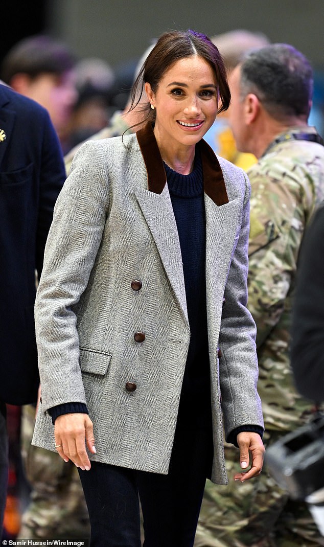 She then attended the wheelchair basketball game between Team USA and Team Nigeria at the Vancouver Convention Centre. Meghan's smart casual outfit included another DOÊN piece - the brand's 'Duccia' blazer in the colour castle grey (£562 approximately) - as well as the Stuart Weitzeman black suede boots she hasn't been seen in since November 2017