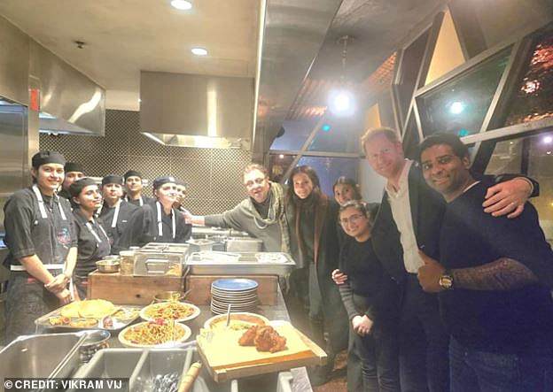 Head chef and restaurant owner Vikram Vij (centre) said Harry and Meghan went back to the kitchen with Buble and his wife Luisana to thank staff and were 'gracious and grateful'