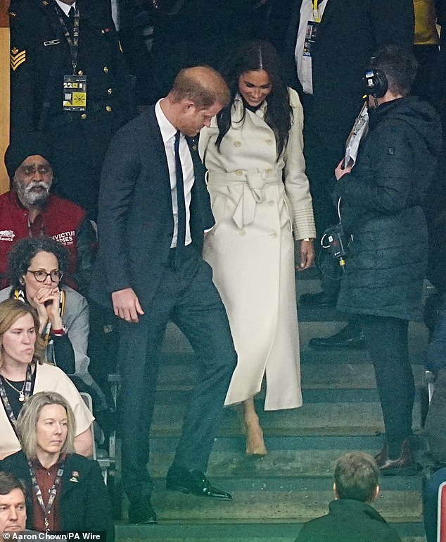 Prince Harry and Meghan Markle entered the ceremony to an outburst of cheers from the crowd