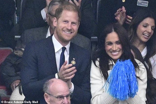 The couple were smiling from ear to ear as they watched the Invictus opening ceremony in Vancouver