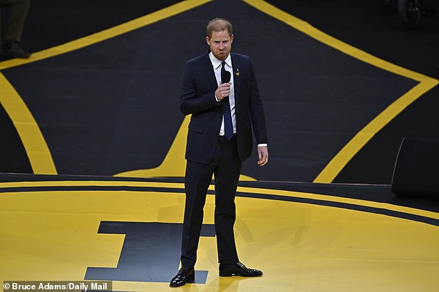 Prince Harry later took to the stage to speak of his ¿sacred obligation¿ to do everything he can to help military veterans like himself as he was given a hero¿s welcome at the opening ceremony of the Invictus Games