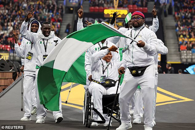 Nigerian athletes take part in the parade during the opening ceremony of the Invictus Games