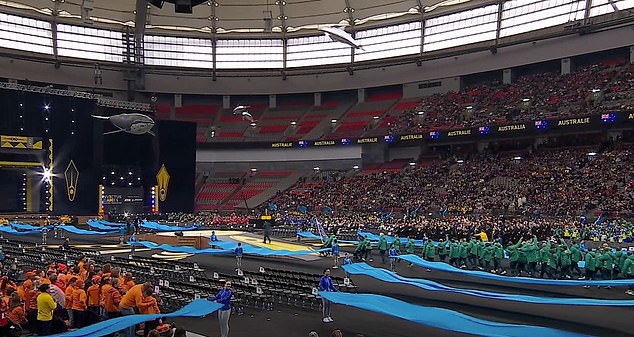 Athletes and the crowd burst into cheers as the ceremony continues in Vancouver tonight