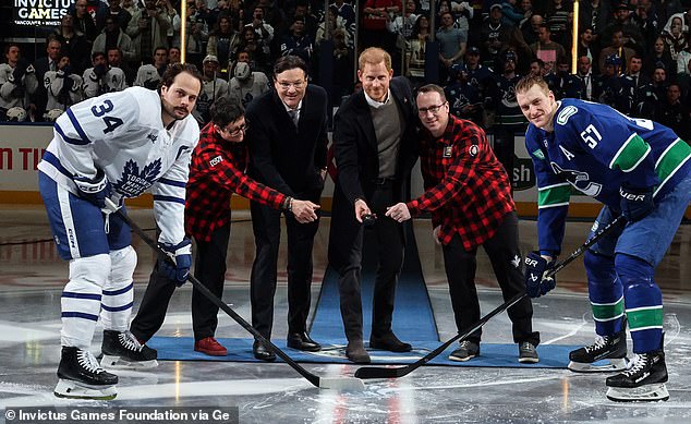 Pictured: (From L to R) Auston Matthews, Team Canada athlete Lee Jarratt, Chairman of the Vancouver Canucks Francesco Aquilini, Prince Harry, Duke of Sussex, Team Canada athletes Andre Crocker and Tyler Myers seen at the ceremonial puck drop before the Canucks game against the Maple Leafs at Rogers Arena on February 08