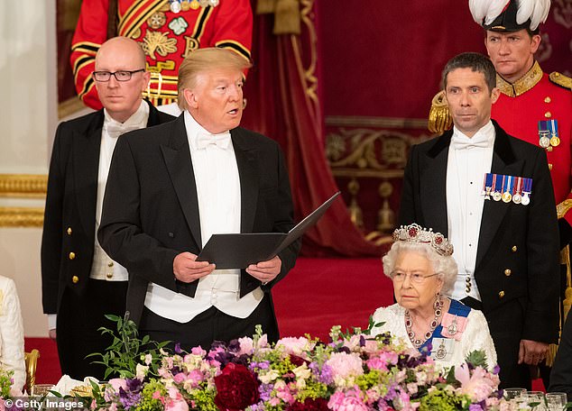 Donald Trump pictured making a speech during his state visit to the UK in 2019 - as the late Queen Elizabeth II listens on