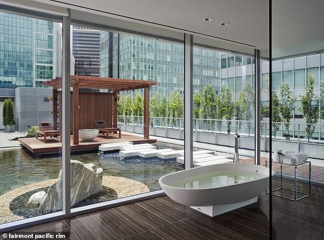 The couple are staying in the Chairman's Suite in the five star Fairmont Pacific Rim Hotel with its breathtaking views across the Coal Harbour to snow-capped mountains in the distance