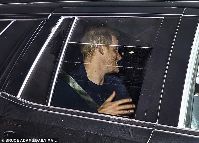 Prince Harry was all smiles as he arrived at his five-star hotel for the start of the Invictus Games