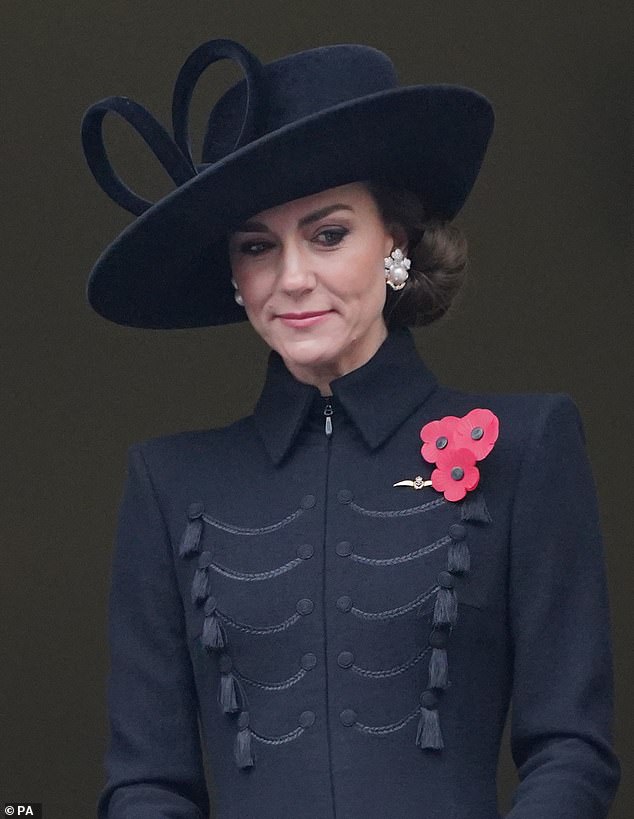 The Princess of Wales smiles while watching her husband during the Remembrance Sunday service in 2023, wearing the same hat she donned years before at his passing-out parade