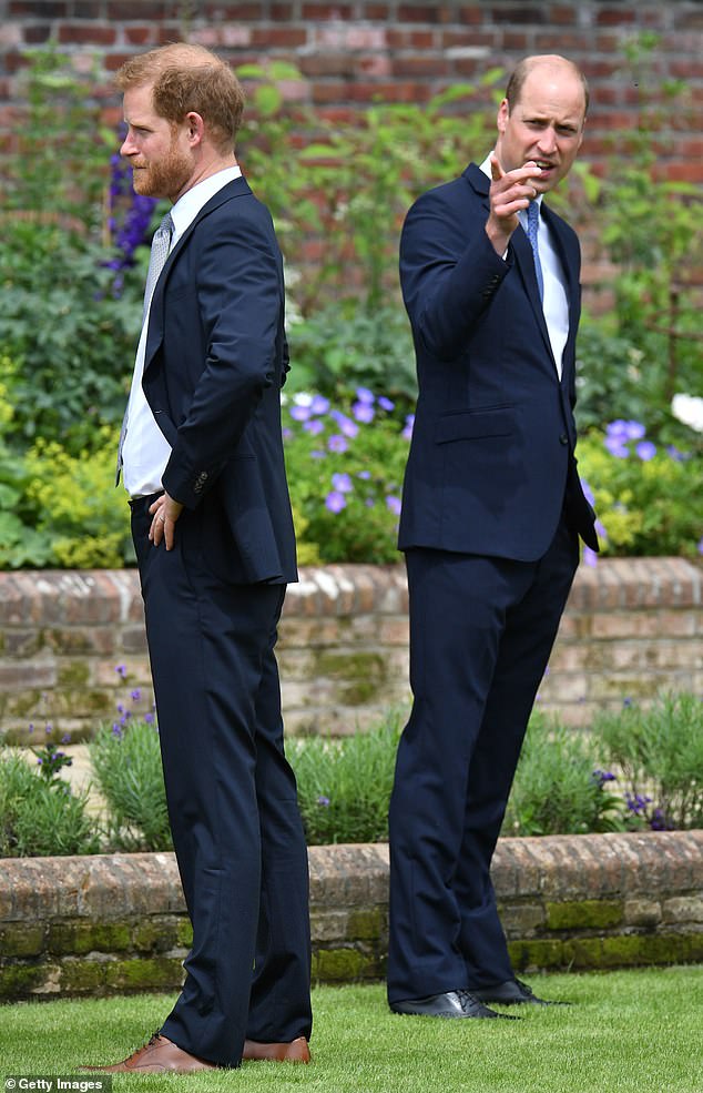 Prince Harry and Prince William speak with garden designer Pip Morrison, during the unveiling of a statue they commissioned of their mother Diana in 2021