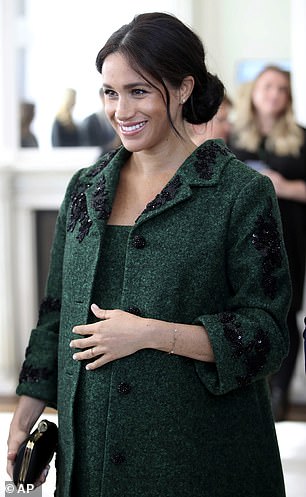 Meghan's maternity coat by Erdem worn in March 2019 - almost 27 years later to the day