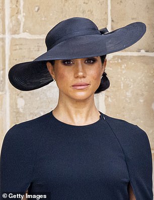 Since then, he has designed headwear for Meghan Markle, who he notes 'always wears the hat - the hat doesn't wear her'