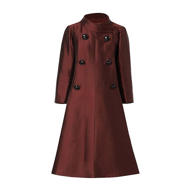 Attending the christening of Zara Tindall's daughter Lena in March 2019, Meghan donned a vintage Dior 1960s silk coat sourced from William Vintage