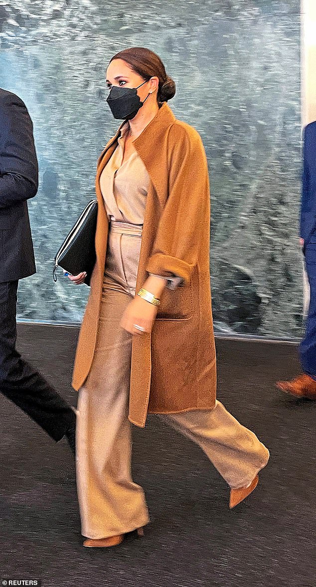 Meghan debuted her camel Max Mara 'Lilia' coat during a visit to the UN headquarters in New York in September 2021, and wore it again in February 2024 for lunch in Beverly Hills