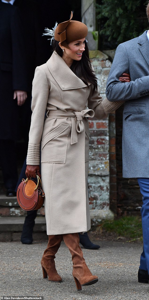 For her first Christmas at Sandringham, Meghan wore a Sentaler wrap coat with tonal accessories