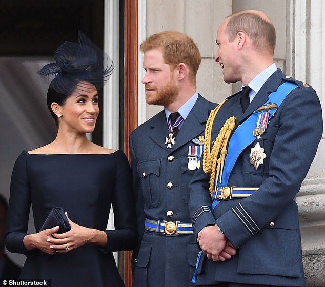 Meghan Markle made 'jokes about Harry having different parents to William' during her time in the royal household, according to a new book. Pictured together in 2018