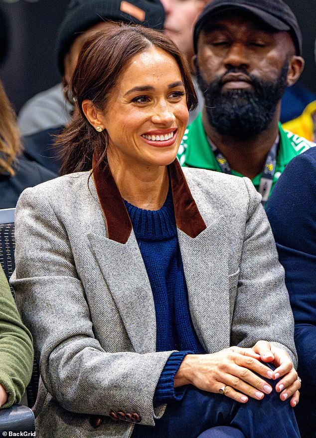 Meghan Markle (pictured watching Wheelchair Basketball at the Vancouver Convention Centre on February 9, during the Invictus Games) pleased Sussex fans by sharing a Valentine's Day themed video featuring the children