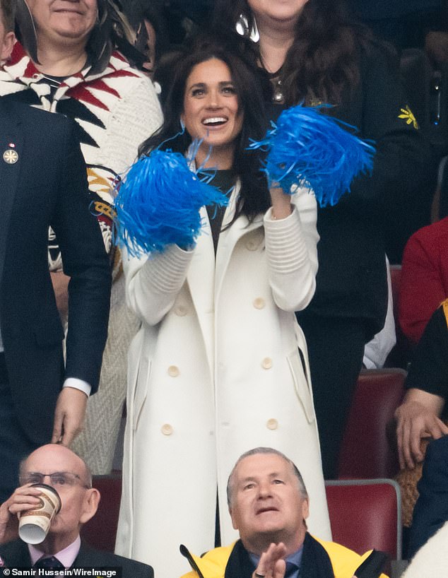 The Duchess of Sussex has sported a series of elegant fashion pieces at the Invictus Games 2025, including a £2,400 'Baby Alpaca Maxi Trench Coat' in 'Ivory' from Sentaler (pictured)