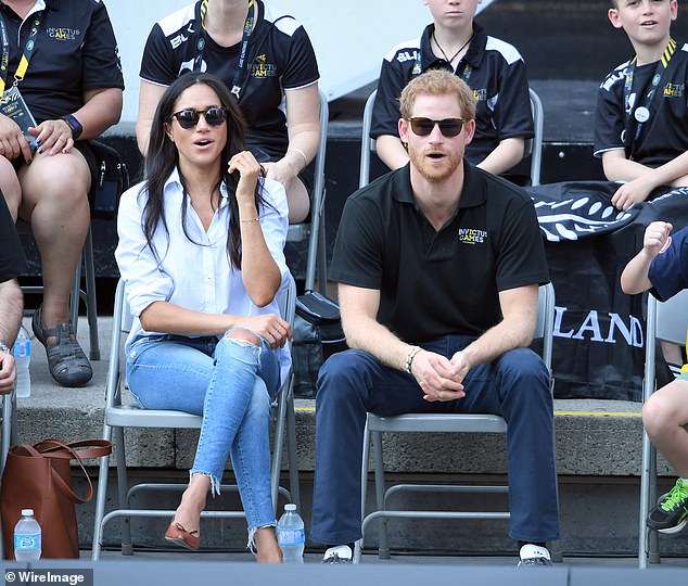 Meghan Markle and Prince Harry watching wheelchair tennis in their first public appearance together back in 2017